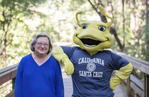 Photo of Chancellor Cindy Larive with Sammy Slug
